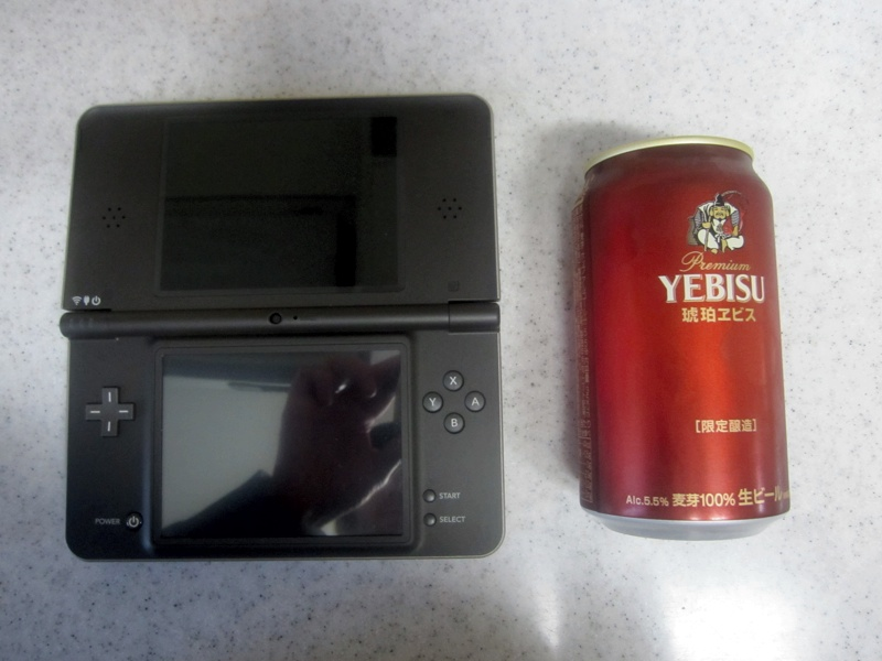 Illustration for article titled Is The DSi LL Bigger Than Uncharted 2, Nolan Ryan's Autograph, A Can of Beer?